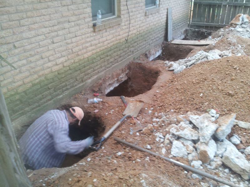 man digging a hole